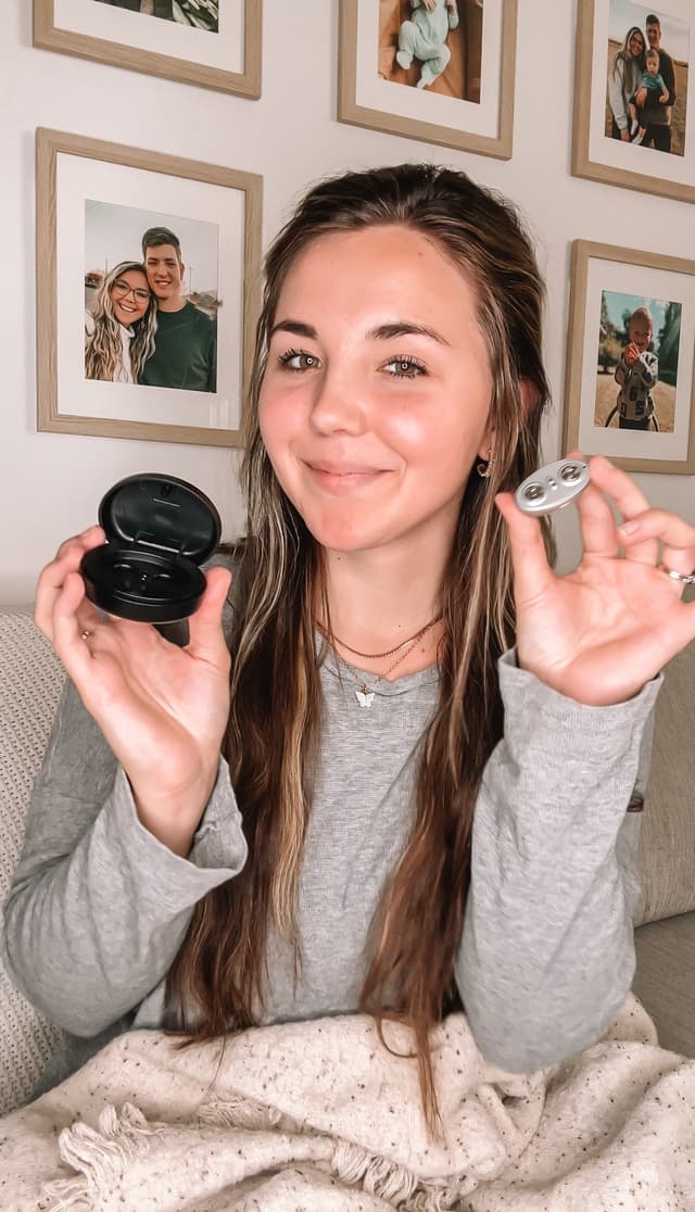 Customer holding the SleepEase Pro case and electrode